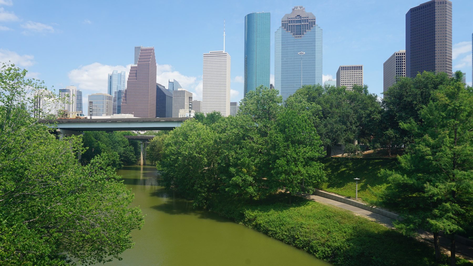 Buffalo Bayou Park with the downtown Houston skyline behind it